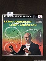 Front cover of Leroy Anderson Conducts Leroy Anderson vintage vinyl LP record showing conductors portrait and album title.