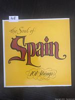 Front cover of The Soul of Spain LP by 101 Strings, yellow background with red and brown title text.