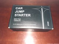 Closed box labeled 'Car Jump Starter 800A Peak 12000mAh' CF200 model for 12V vehicles up to 4.0L Gas or 2.0L Diesel Engines.