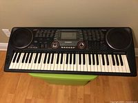 Full front view of Casio CTK-631 keyboard showing keys, speakers, and control panel.