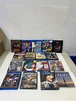 Five top-row cases: Ministry of Ungentlemanly Warfare, The Marvels, Toy Story, Bullet Train, The Batman