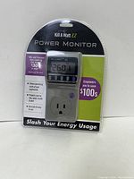 Front view of new packaged Kill A Watt EZ Power Monitor showing device and branding.