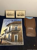Lot showing all items together: two nautical prints, watercolour painting, Jeppesen slide computer case