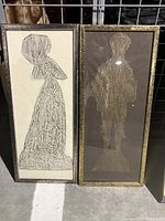 Photo showing two framed rubbings: a woman in traditional shawl headwear on a light background, and a detailed figure on a dark background.