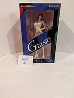 Photo showing front view of unopened G-taste Vol.3 anime statue box by Yamato with female figure visible through the window.