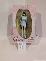 Photo of first G-taste anime statue, female in blue nurse outfit with white boots and nurse cap, boxed