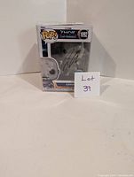 Front view of autographed Gorr The God Butcher Funko Pop in box with lot number note.