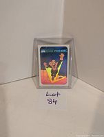 Front view of the Marvel Comics Series 1 Cosmic Spider-Man hologram card in protective case showing card art and title