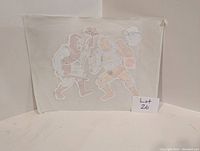 Vintage iron-on transfer on thin paper depicting He-Man and a skeletal warrior in battle pose.