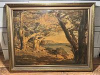 Frontal view of the artwork showing a landscape painting with trees and water.