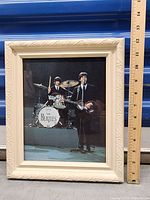 Framed photo print showing Ringo Starr and Paul McCartney performing on stage during The Beatles 1964 television appearance on Shindig!