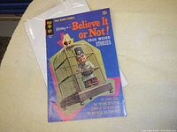 Photo of the Ripley's Believe It or Not True Weird Stories vintage comic book showing front cover artwork and title.