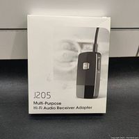 Closed product box showing model J205 and multi-purpose hi-fi audio receiver adapter label.