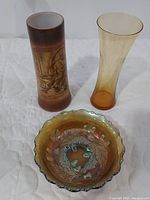 Three vintage glass items: Westmoreland transfer milk glass vase, amber art glass vase, Fenton carnival glass acorn ruffled bowl
