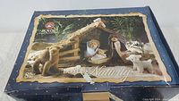 Photo of closed original box showing the Boyds Nativity 8-piece set illustrated on front with the bears and manger.