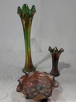 Full set of carnival glass items including two vases and a bowl