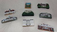 Nine Cat's Meow blocks displayed on white surface, showing various presidential homes and landmarks including White House and Mount Vernon.