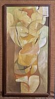 Frontal photo of the framed cubist style oil painting showing an abstract human figure in earth tone colors, warm browns, yellows, and beige shades.