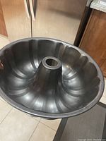 Top view showing the interior fluted design and center tube of the baking pan.