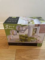 Full boxed packaging of KitchenStuff Veggie Twist Spiral Slicer showing three blade types and product image