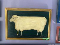 Frontal shot of entire framed painting on wall