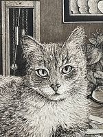 Close-up detail of the cat's face and background elements showing intricate etching details.