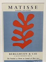 Close-up image of the lithograph print showing the red organic shape against the blue background, with title text at the top and exhibition details and signature below.