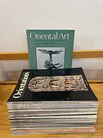 Photo shows a stack of 29 magazines with a visible cover of Oriental Art Winter 1992/3 issue and Orientations magazines beneath it