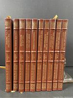 Photo showing all 10 volumes upright with spines visible, displaying gilt titles and the Easton Press logo.