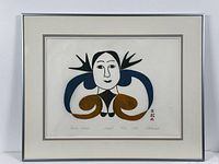 Framed full view showing print within silver frame and double mat