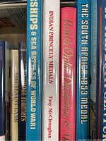 Photo showing close-up of five books: Warships & Sea Battles of World War I, Indian Princely Medals, British Military Decorations & Medals, The South African 1853 Medal, Tank Hunters.