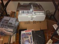 Overview of accessories including extension table, manuals, embroidery hoop, presser feet and cable