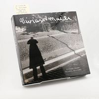 Front cover of the book with title and silhouette photograph