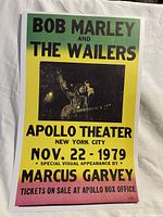 Full view of the vintage Bob Marley poster with color gradient background and central photo, text advertising the November 22, 1979 concert at the Apollo Theater in NYC.