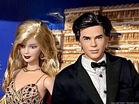 Close-up of Barbie and Ken dolls dressed as Bond Girl and James Bond showing detailed facial features and outfits.