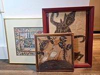 Three items together: Indian court scene print, dancing girl print, and ceramic tile with birds. All framed and wired for hanging.