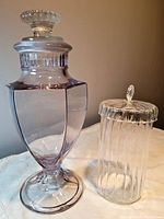 Both containers shown side by side, highlighting relative sizes and shape differences.