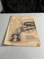 Front cover view of the February 1960 Cavalcade magazine showing title, image of a revolver and portrait of an Old West gunslinger, with some discoloration and wear.
