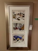 Full view of framed set of three numbered winter scene prints