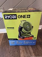 Front and side views of the Ryobi 18V One+ misting fan box showing product branding, specs, and features.