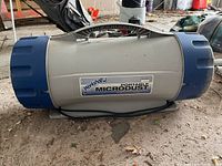 Full side view of the Portable Workshop Micro Dust Air Filter System AB250 showing overall condition and label.