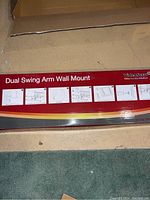 Box showing the product title and brand "Dual Swing Arm Wall Mount" by VideoSecu with pictorial installation guide.