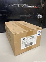 Box containing 48 GE incandescent light bulbs, 75 watt, soft white.