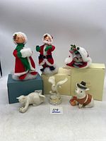 Full assembled collection including three Annalee Christmas dolls, Lenox porcelain cat figurine, eagle trinket box and pig figurine.