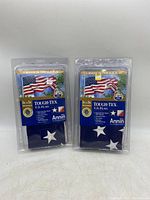 Front view of both new U.S. flags in plastic packaging showing brand and product details