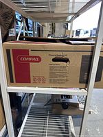 Box of Compaq Presario PC showing brand and model