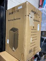 Full box showing DecoHome branding and image of the portable washing machine.