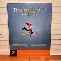 Full poster showing cartoon witch on broomstick with text 'The magic of Prime.' and PRIME branding.