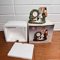 Box and styrofoam packaging with image of Bugs Bunny clock for reference. Included to depict packaging and lot completeness.
