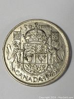 Obverse side of 1943 Canadian half dollar coin showing denomination, date, and coat of arms
